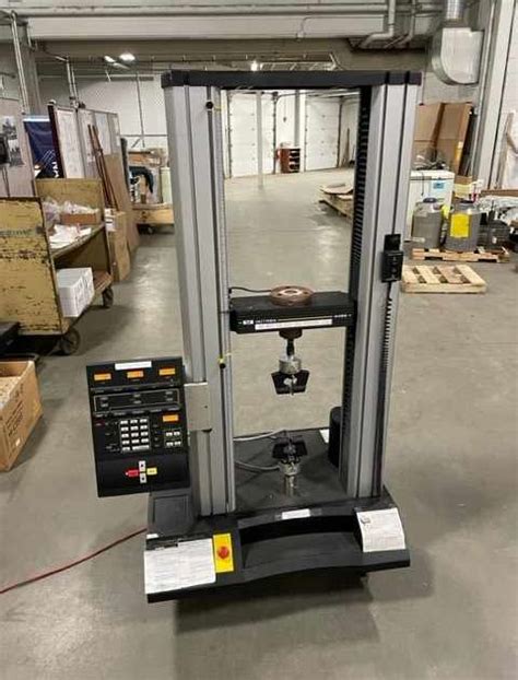 instron model 4466 universal testing machine accuracy|instron at6 system.